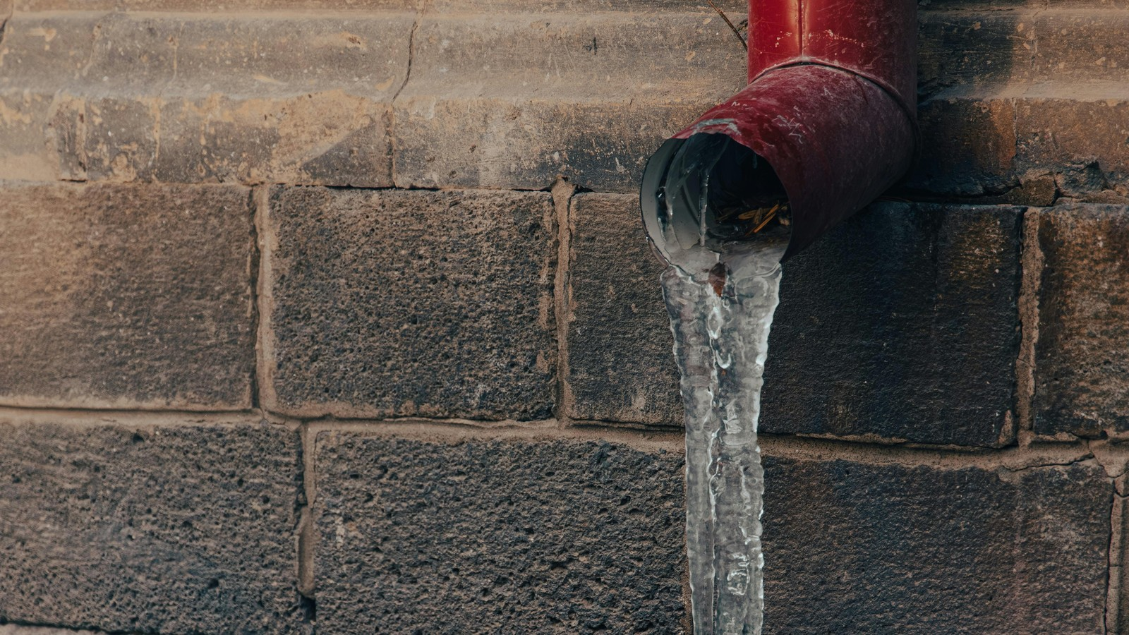 Ice buildup forming on a residential plumbing line